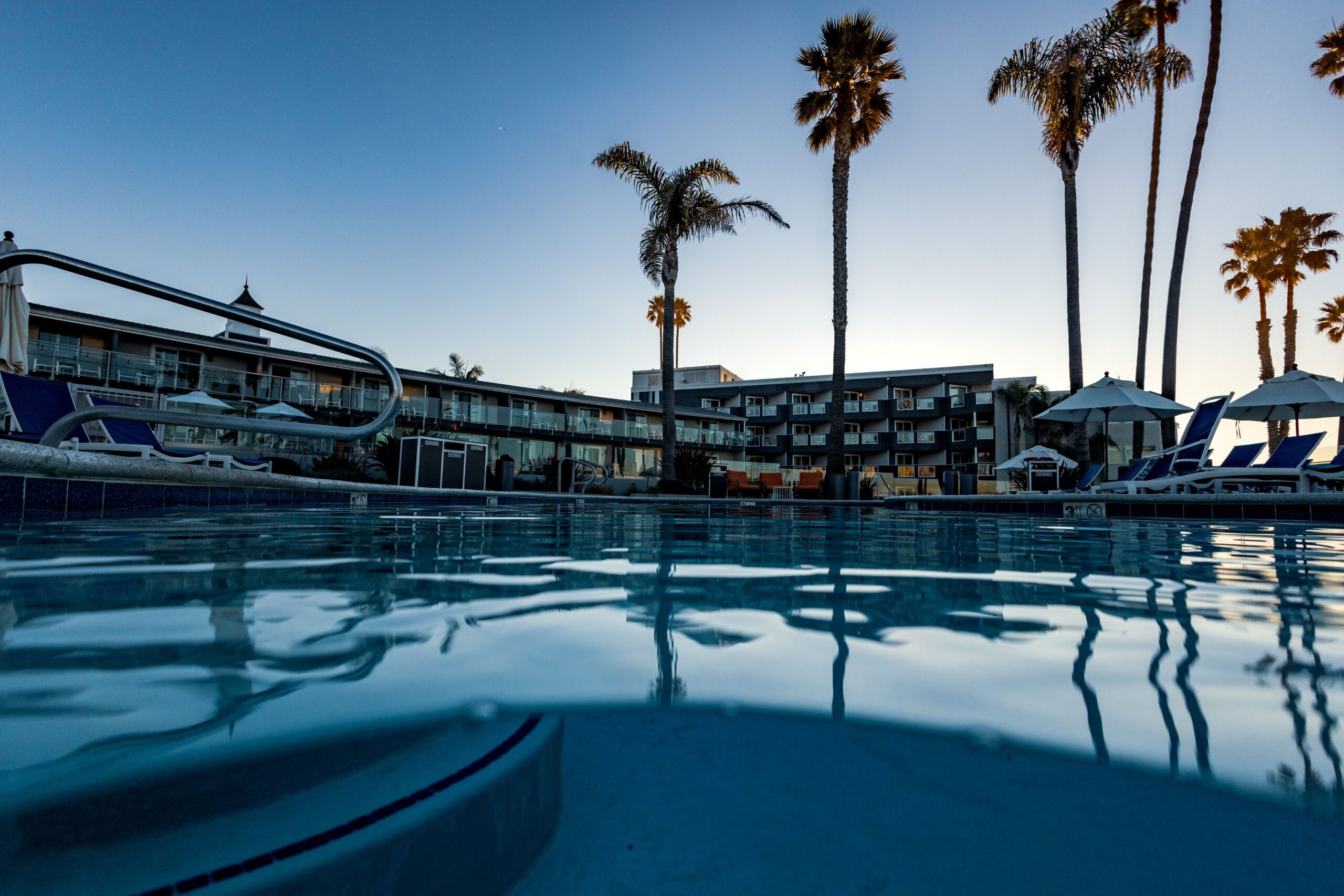 SeaCrest OceanFront Hotel pool and palm trees